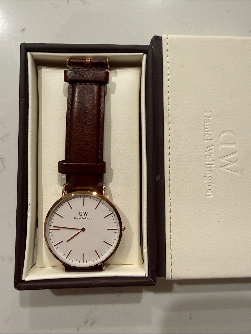 Daniel Wellington Watch- Gold Case, Brown Leather Strap, and White Face